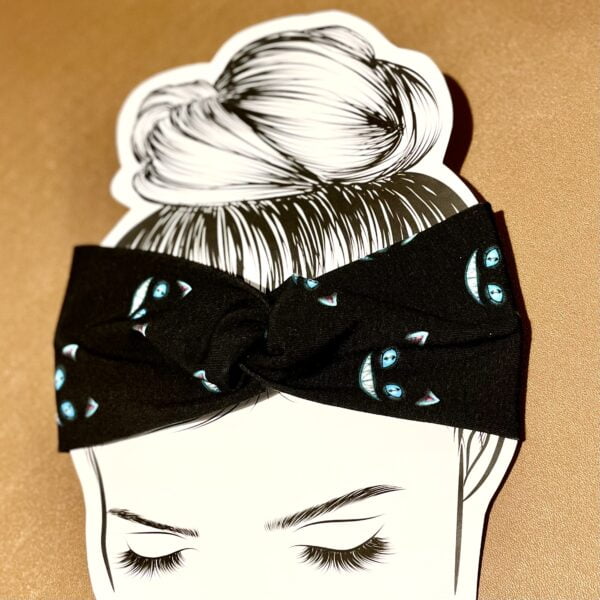 Twisted Side of Grinning Cats on Black twisted headband