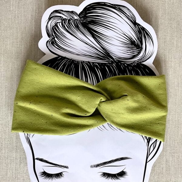 Twisted side of Twisted Headband made from pistachio colour cotton jersey with confetti flecks